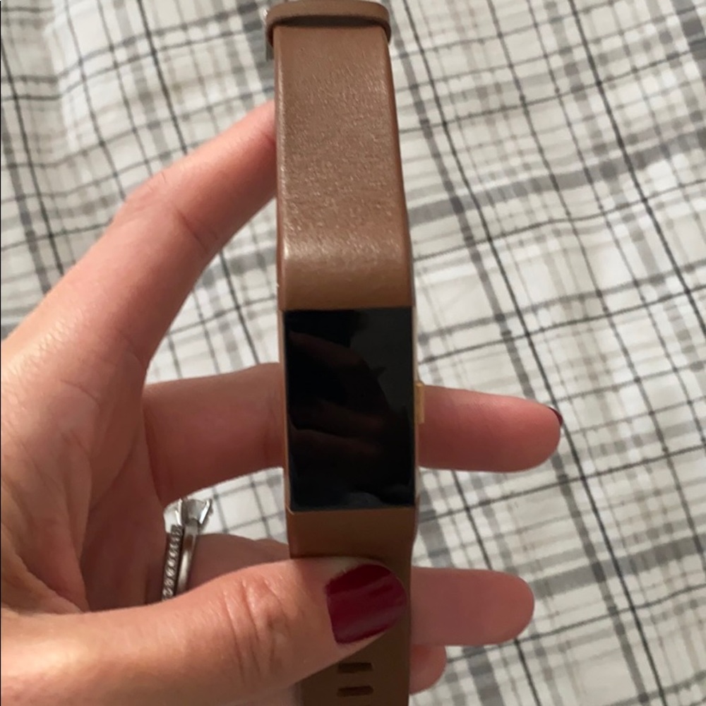 FitBit Charge 2 in Rose Gold.